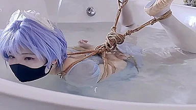 Chinese Girl In Pantyhose And Leotard Hogtied In The Bathtu