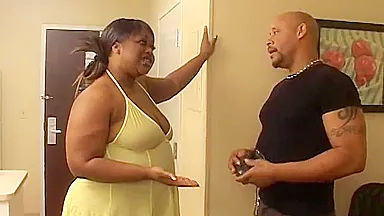 Black Girl Leans Over In Bed And Sucks On A White Cock